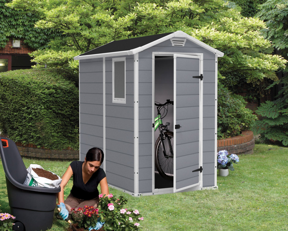 Keter Manor 4 ft. W x 6 ft. 4 in. D Plastic Vertical Storage Shed